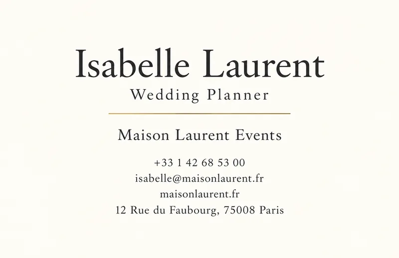 Elegant ivory business card for Isabelle Laurent, Wedding Planner, with serif type and a thin gold rule